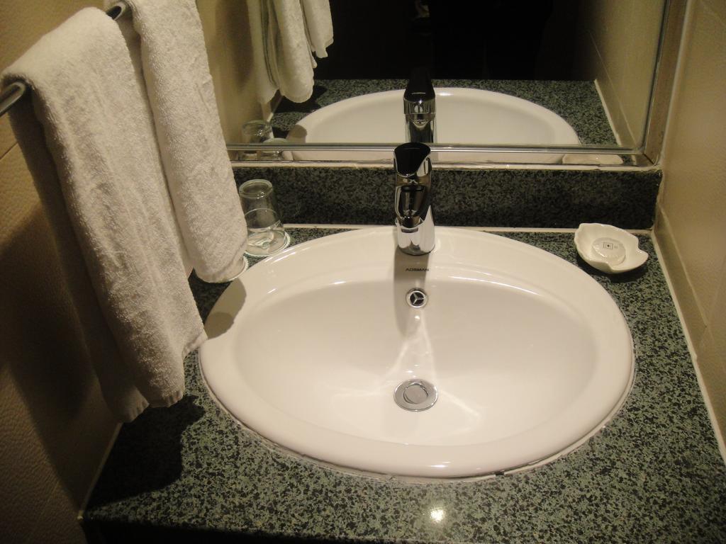 New Gloria Plaza Garden Hotel Харбин Номер фото