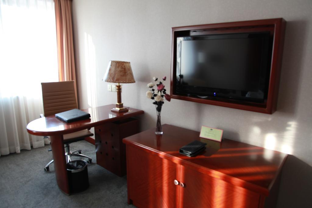 New Gloria Plaza Garden Hotel Харбин Номер фото