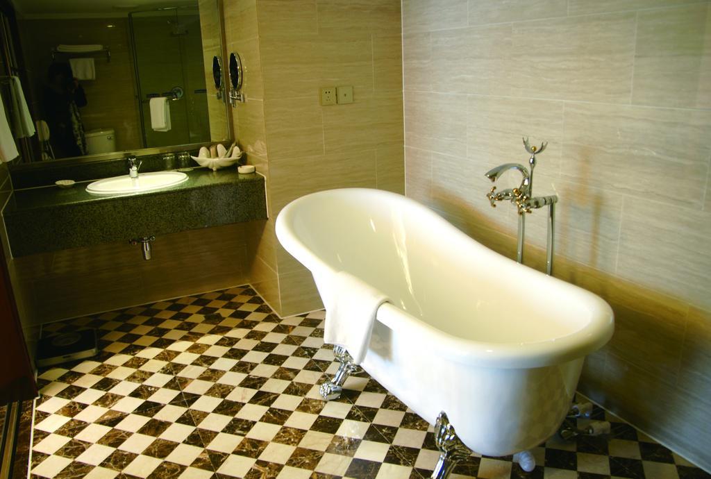 New Gloria Plaza Garden Hotel Харбин Экстерьер фото