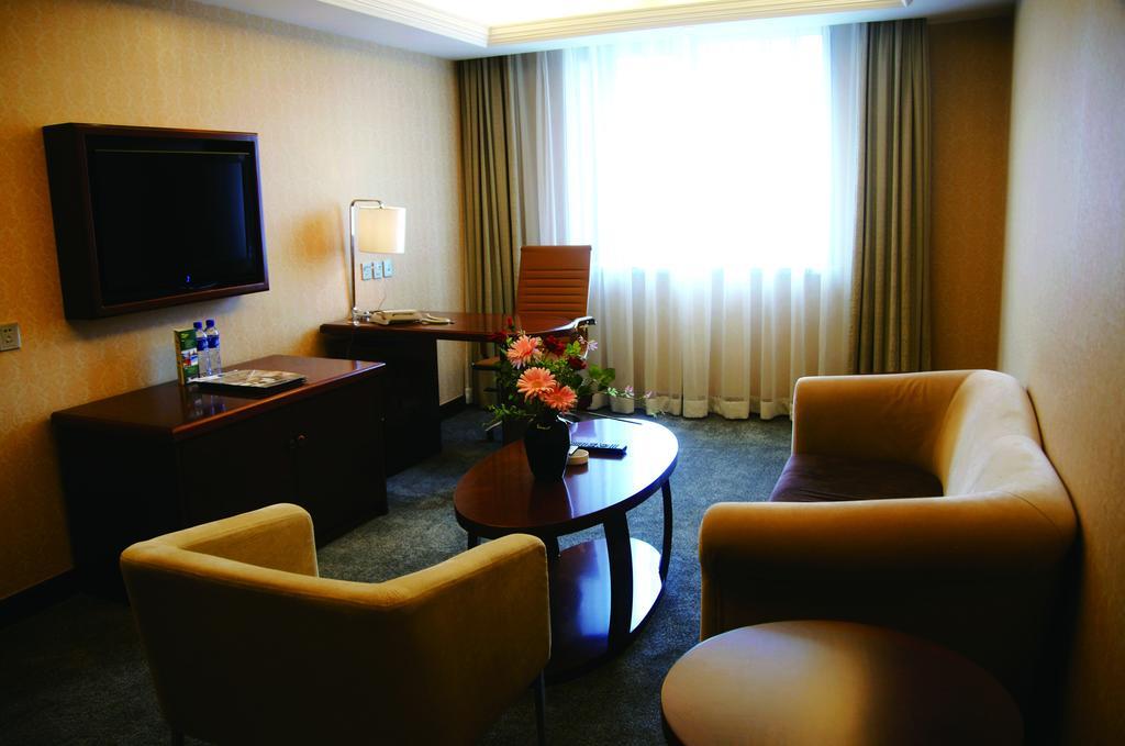New Gloria Plaza Garden Hotel Харбин Экстерьер фото