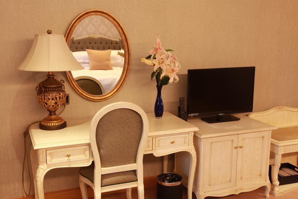 New Gloria Plaza Garden Hotel Харбин Номер фото