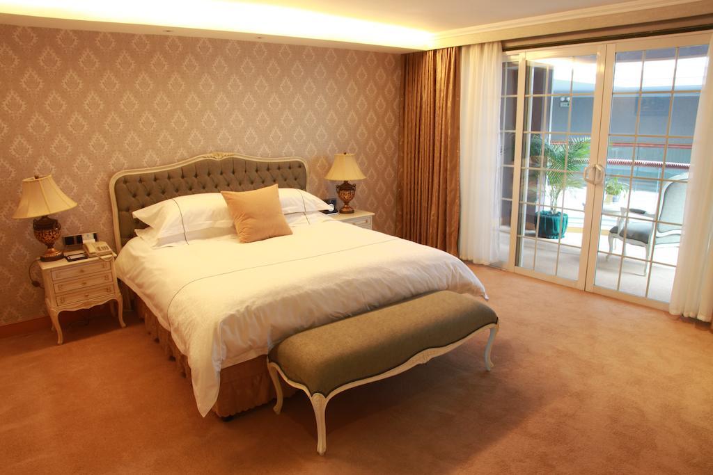 New Gloria Plaza Garden Hotel Харбин Номер фото