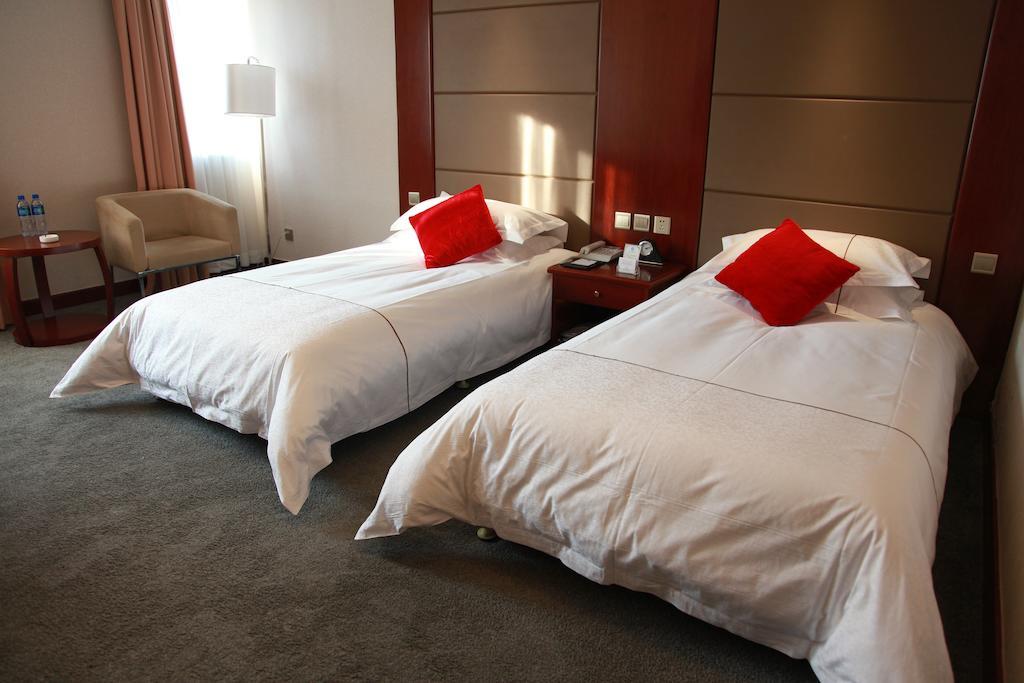 New Gloria Plaza Garden Hotel Харбин Номер фото