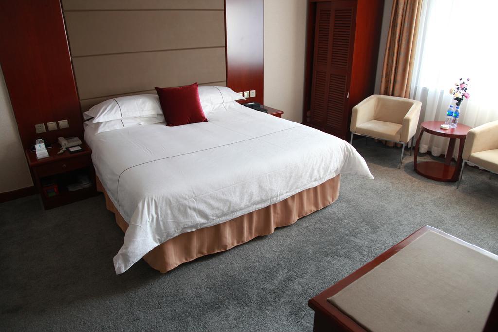 New Gloria Plaza Garden Hotel Харбин Номер фото