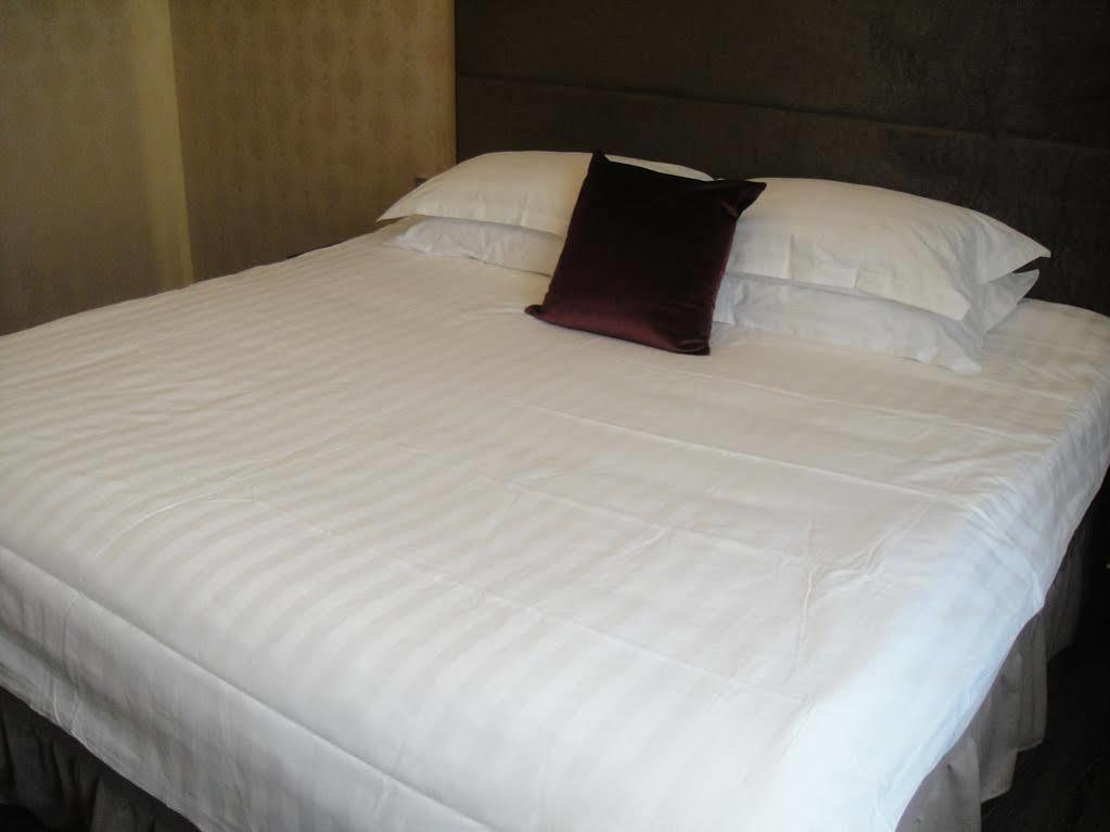 New Gloria Plaza Garden Hotel Харбин Экстерьер фото